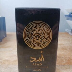Elegant Black and Gold Perfume
